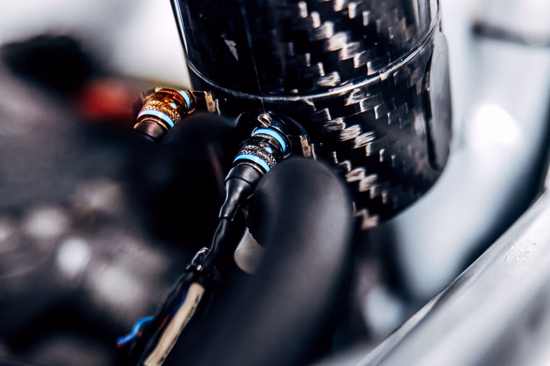 Close-up of the connecting cables for a lightweight drinking-system inside a racecars.