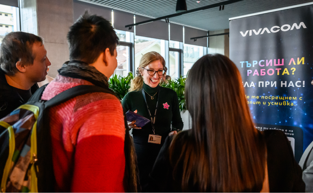 Black and white photograph of a group of people at an event.