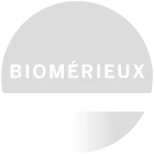 Logo BIOMÉRIEUX su sfondo grigio con riflesso lucido verticale.