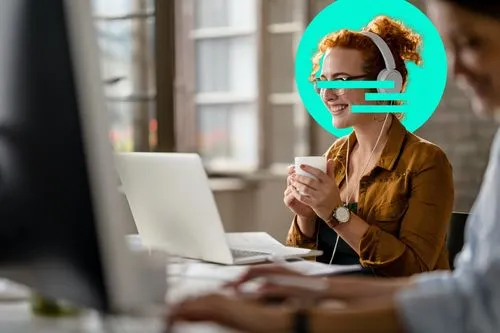 Picture of a woman facing her laptop
