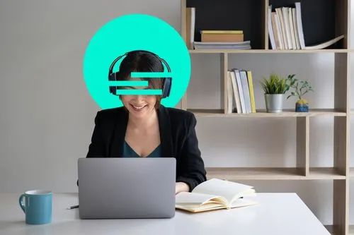 Picture of a woman facing her laptop