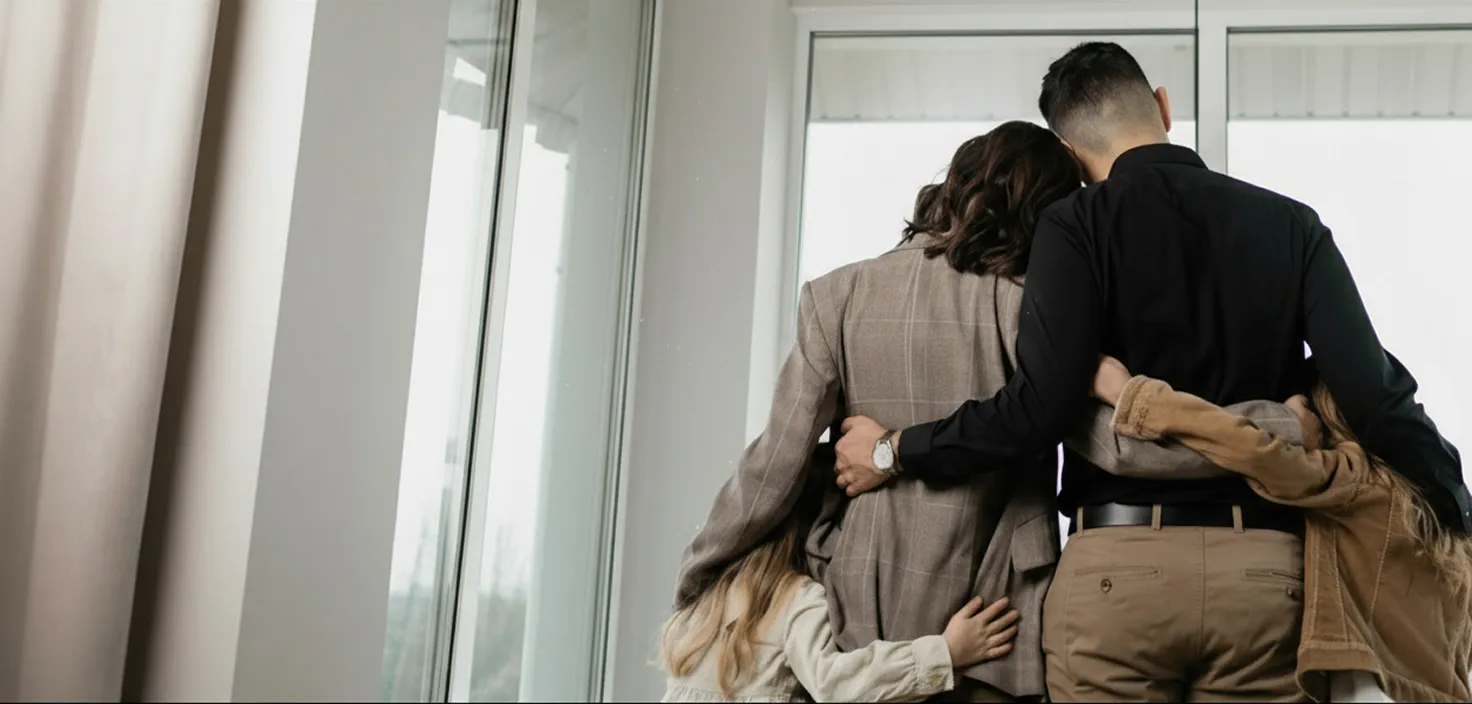 Law enforcement officer escorting person in custody hallway