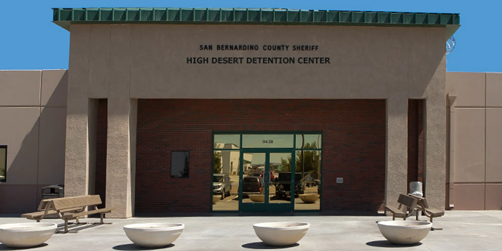 High Desert Detention Center exterior entrance in Adelanto, California.