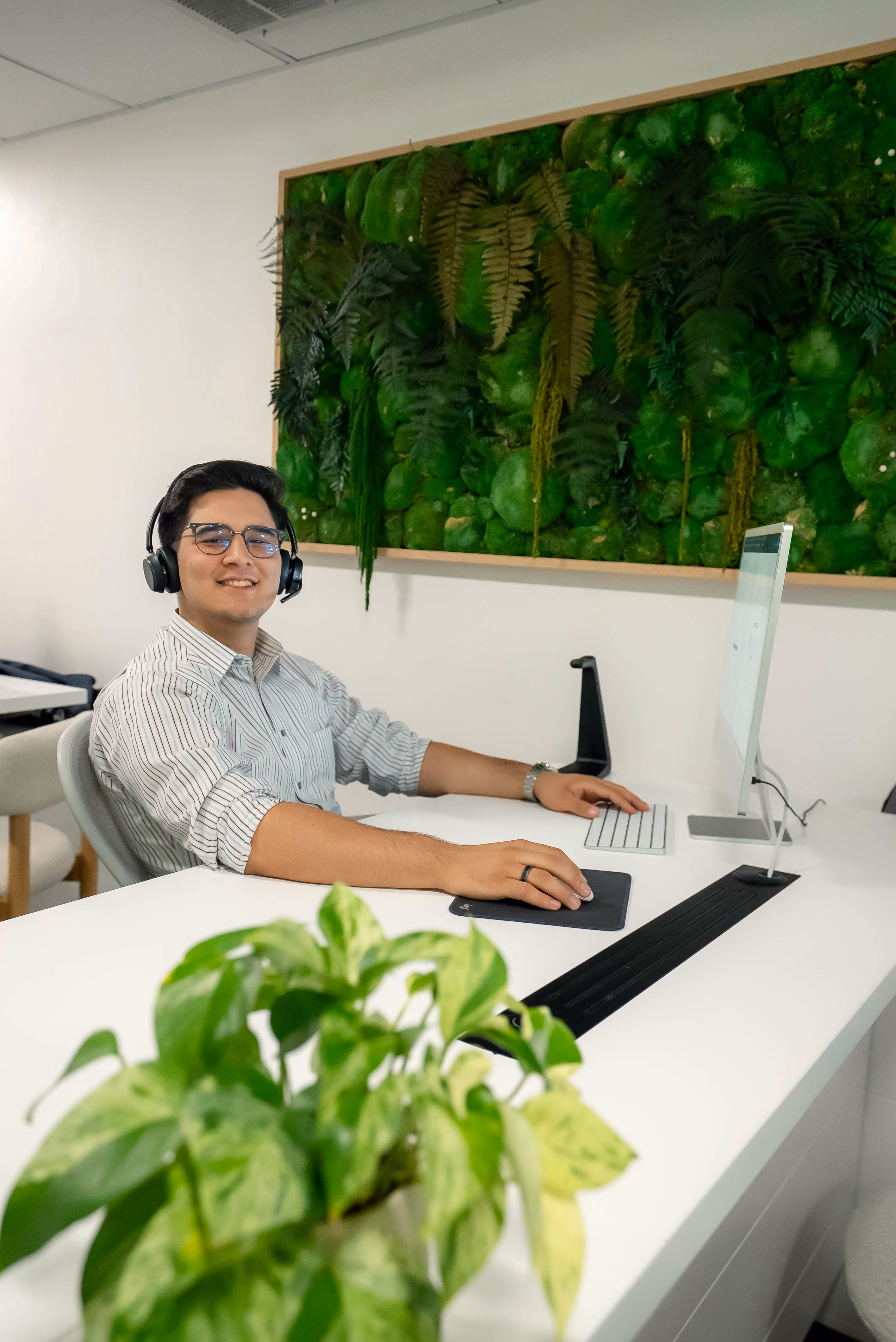 OnCall Bail Bonds agent on a headset, ready to take calls 24/7
