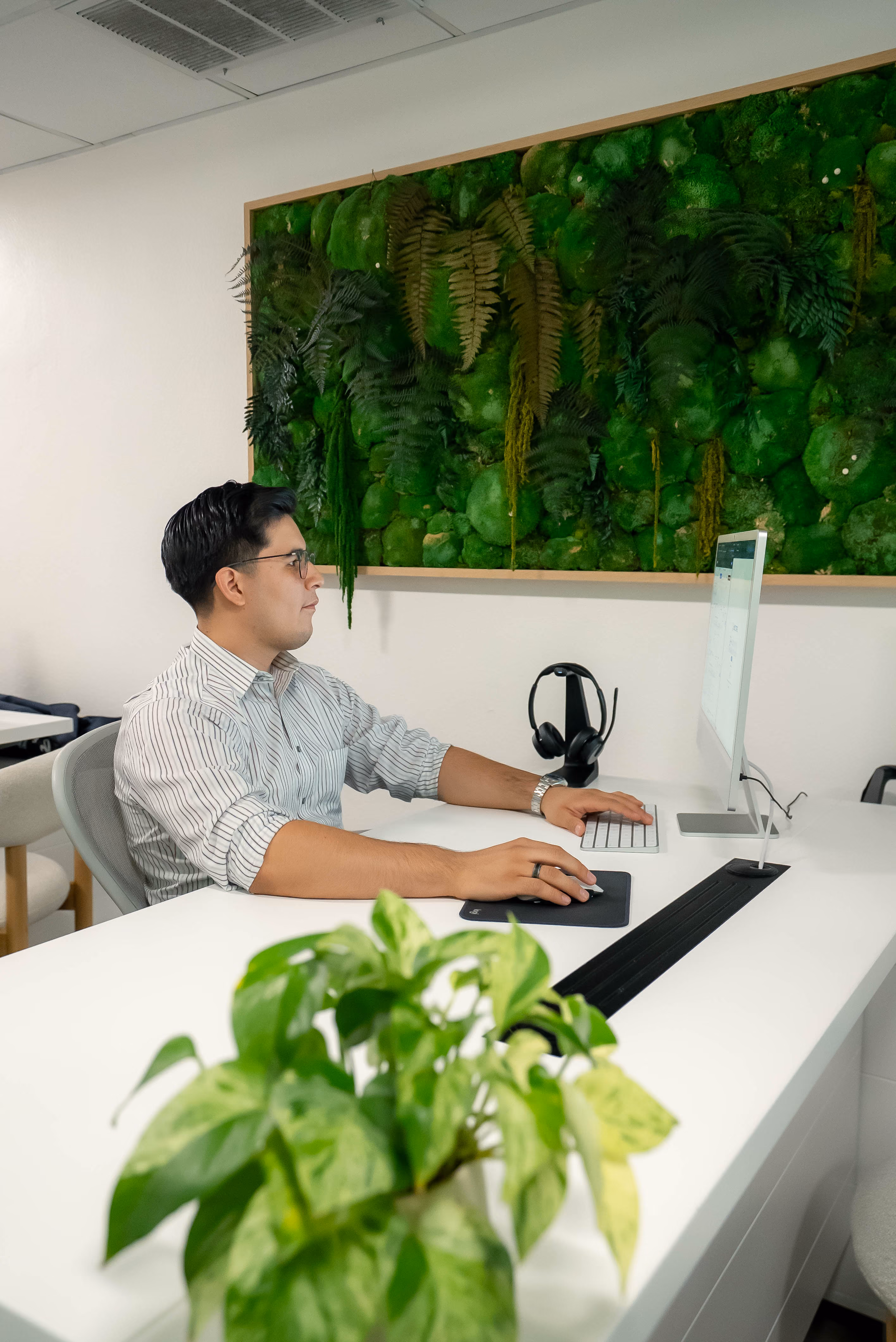 OnCall Bail Bonds agent at his desk in the office