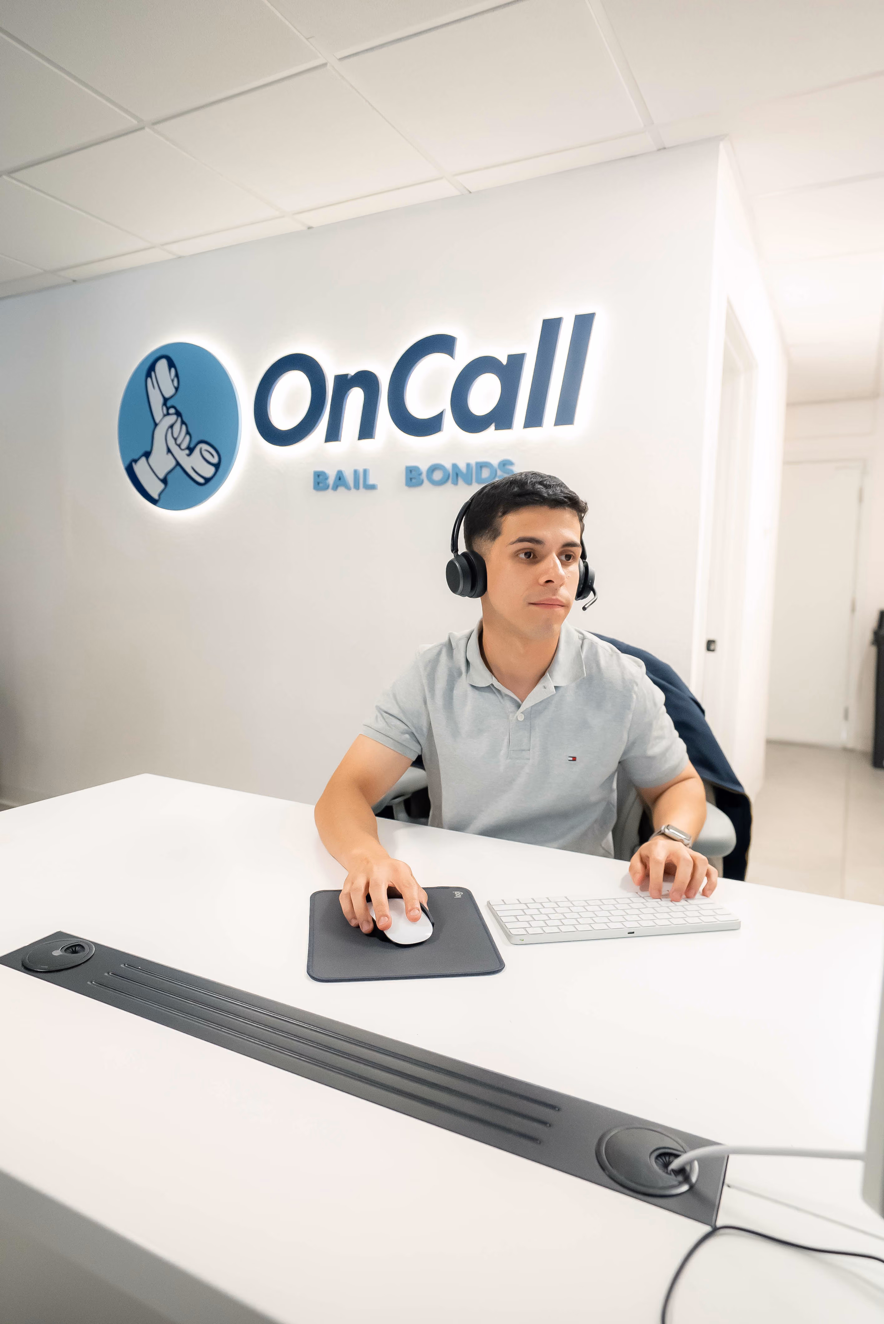 OnCall Bail Bonds agent at the front desk