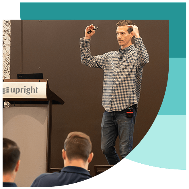 Matt Rodak speaking to the Upright team at a company summit