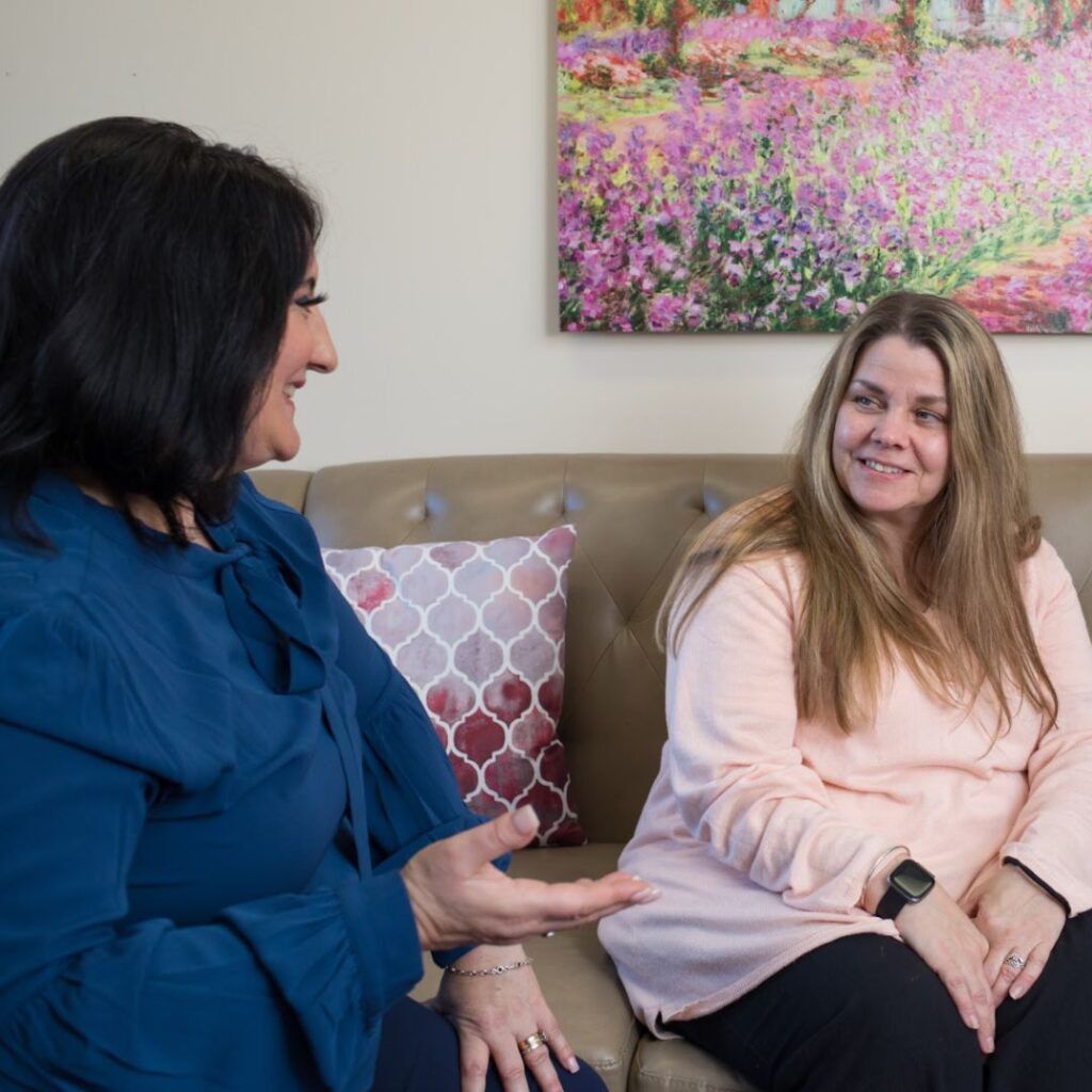 Dr roseann talking to a client