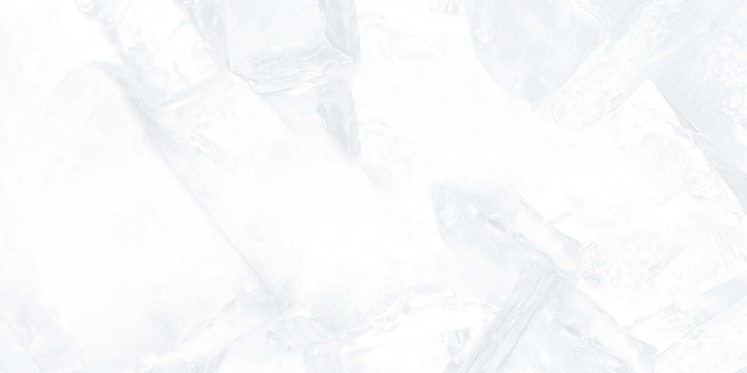 Close-up view of clear ice cubes stacked together.