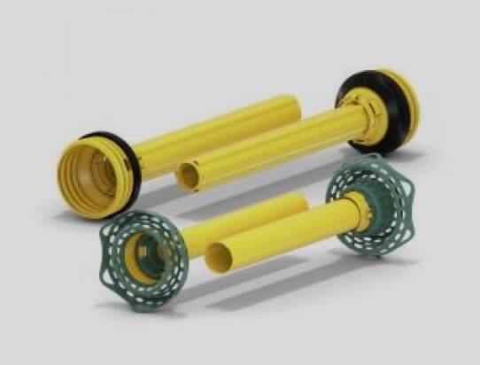 Two yellow cylindrical pipe guards with different protective end caps on a plain light background.