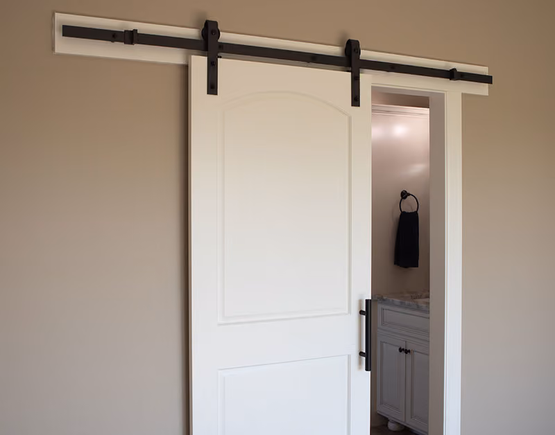 SMSB2 Molded Interior Door with Black Barn Door Hardware and Track Beauty Shot