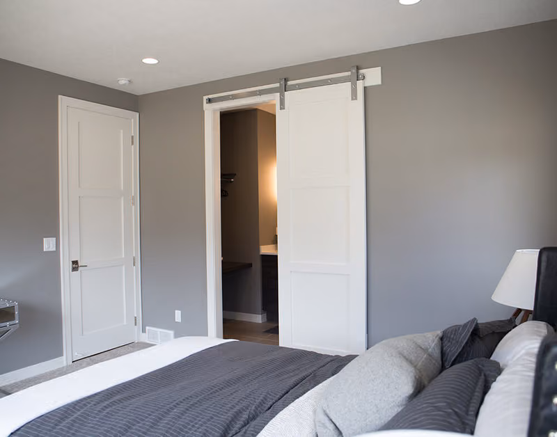 Special Order 3 Equal Panel Primed Stile and Rail Door with Silver Barn Door Hardware and Track Beauty Shot
