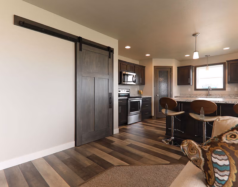 PMA3 Maple Interior Door with Black Barn Door Hardware and Track Beauty Shot