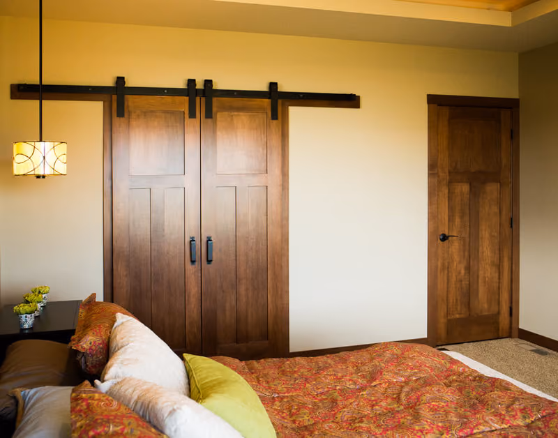 PPOA3 Poplar Doors with Black Barn Door Track and Hardware, 238A Poplar Base, 155A Poplar Casing and BDPH6001B07 Handle Beauty Shot