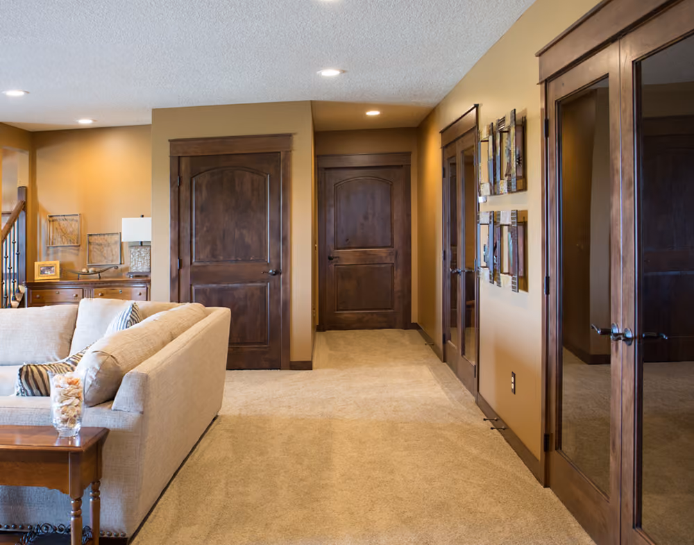  PAKB2 Knotty Alder Interior Door | FAK01 Knotty Alder French Door | Knotty Alder Door Topper | 238A Knotty Alder Base | 155A Knotty Alder Casing | 4001CH Alder Newel | 6210 Alder Railing