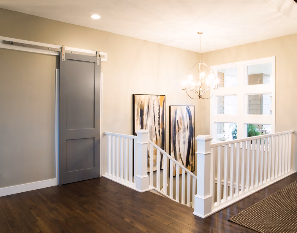 Special Order 8ft Door | 176A Primed Casing | 239A Primed Base | Silver Barn Door Track & Hardware | 4091 Primed Box Newel | 5360 Primed Baluster | 6770 Rail 