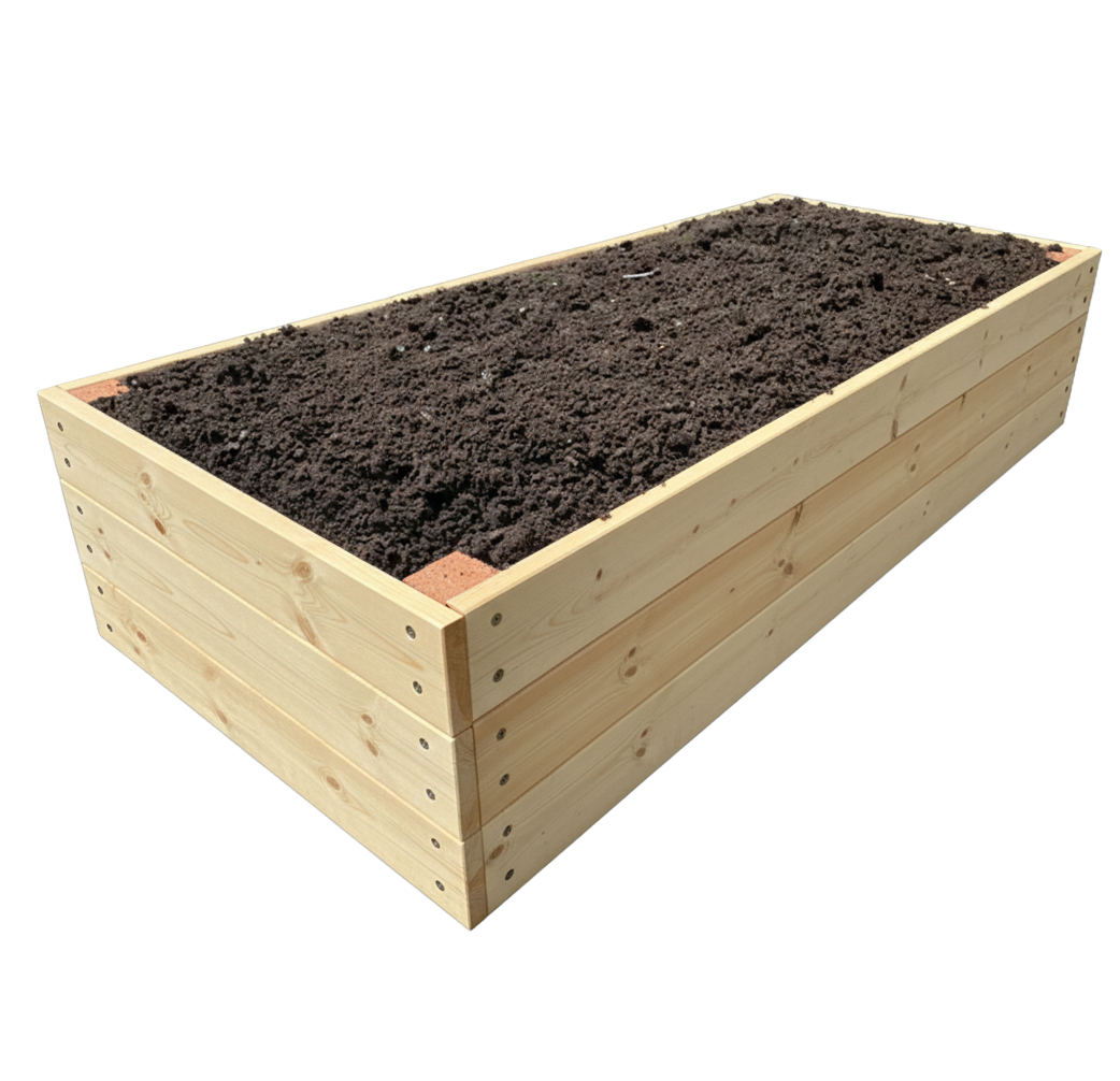 Rectangular wooden raised garden bed filled with dark soil.