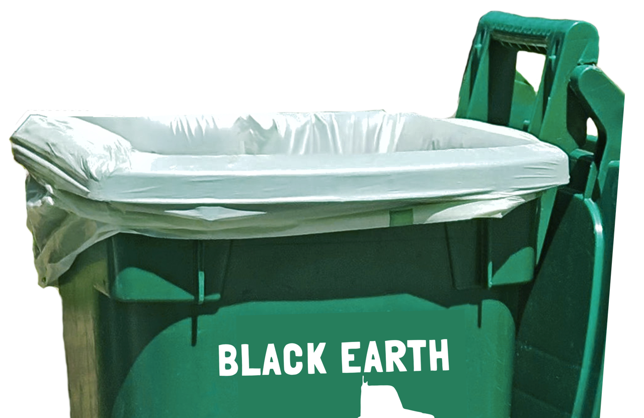 Green trash bin with a white liner and the words 'BLACK EARTH' printed on the front.