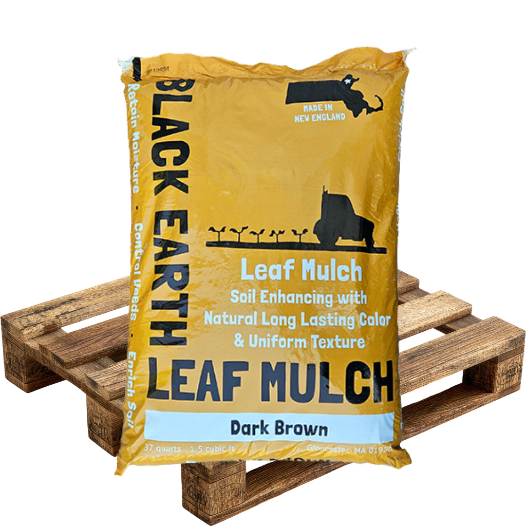 Yellow bag of Black Earth Leaf Mulch labeled as dark brown, placed on a wooden pallet.