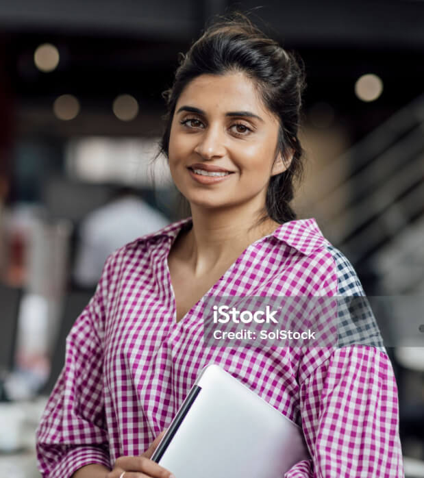 "Smiling professional, representing a financial team member, holding a laptop in a modern office environment. Highlights Onso's benefit in transforming procurement with automation, seamless Xero integration, and streamlining invoice matching.