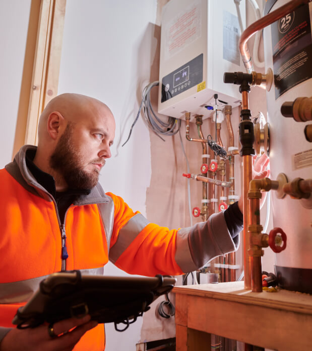 Engineer looking at a boiler