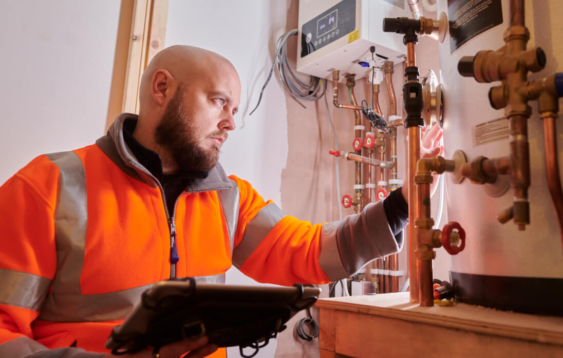 Engineer looking at a boiler