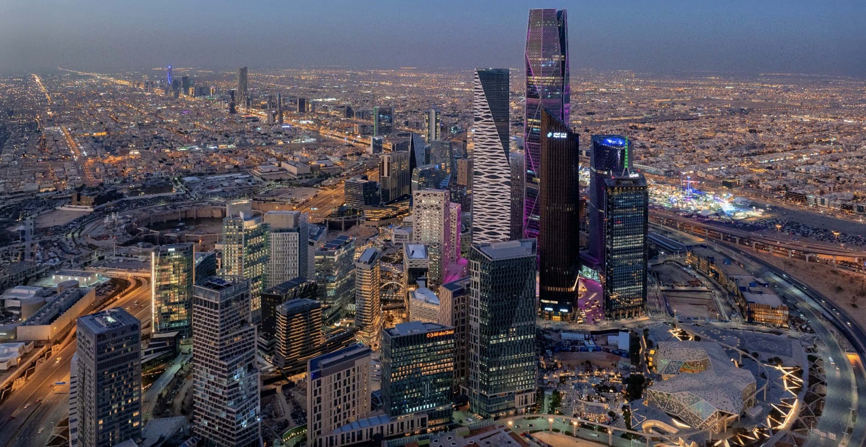 image of a city skyline with construction cranes