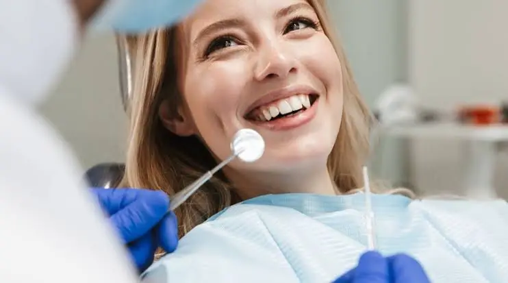 Patient with full-mouth dental implants at Makris Dental in Orlando