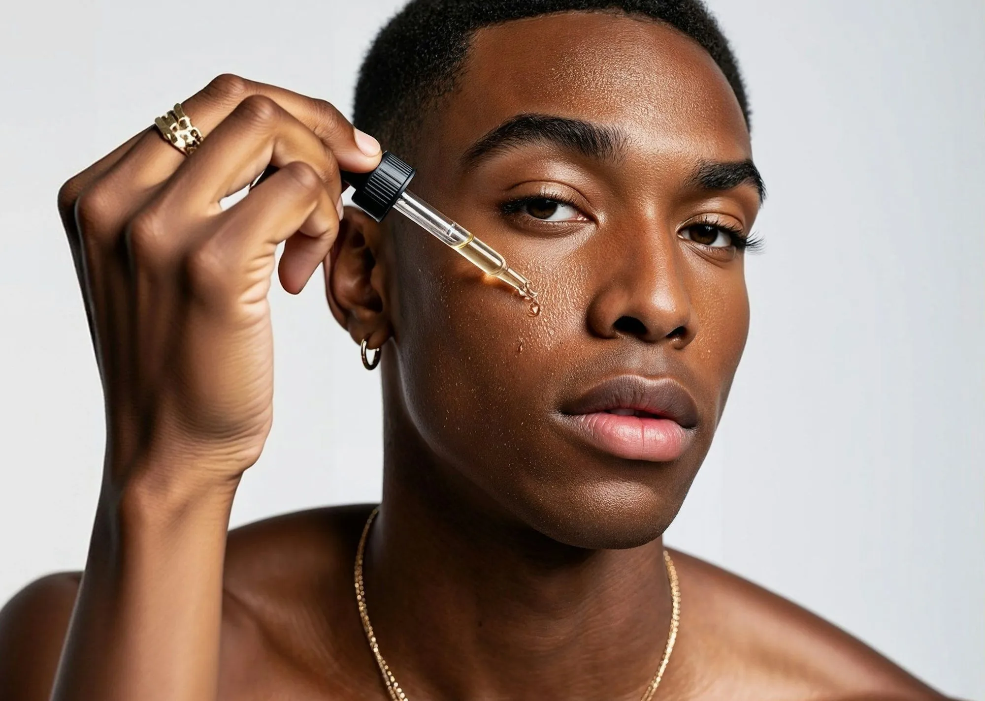 A man with a pen on his forehead.