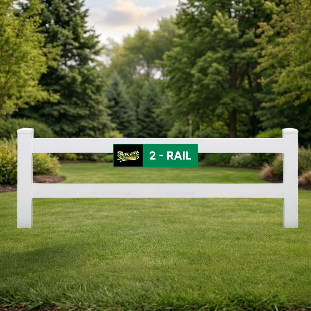 2 Rail white vinyl post and rail fence on a green lawn