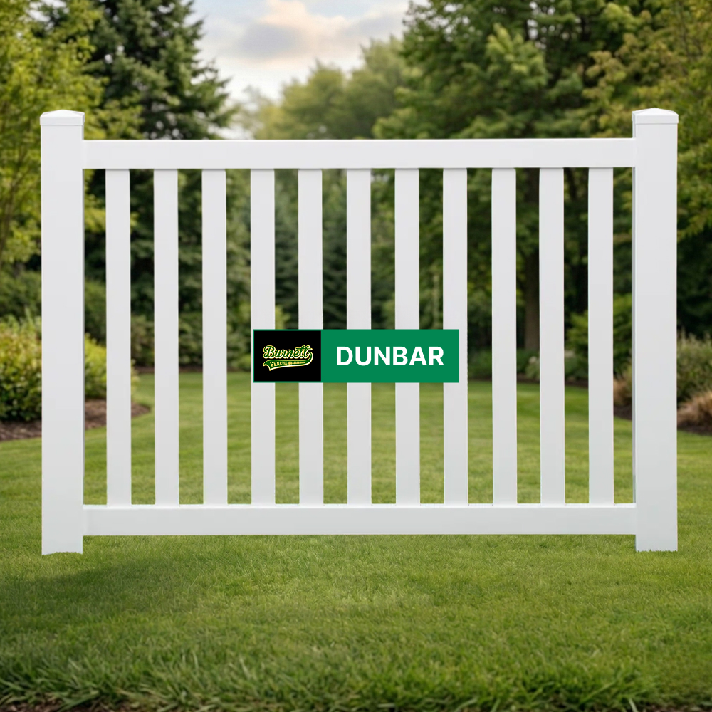 Dunbar white vinyl picket fence with flat top pickets on a lawn
