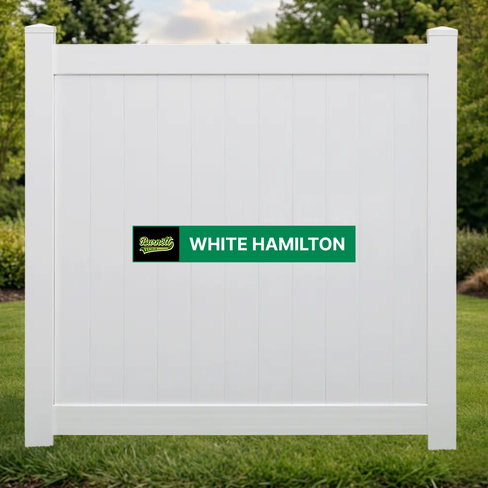 White Hamilton white vinyl privacy fence panel on a backyard lawn