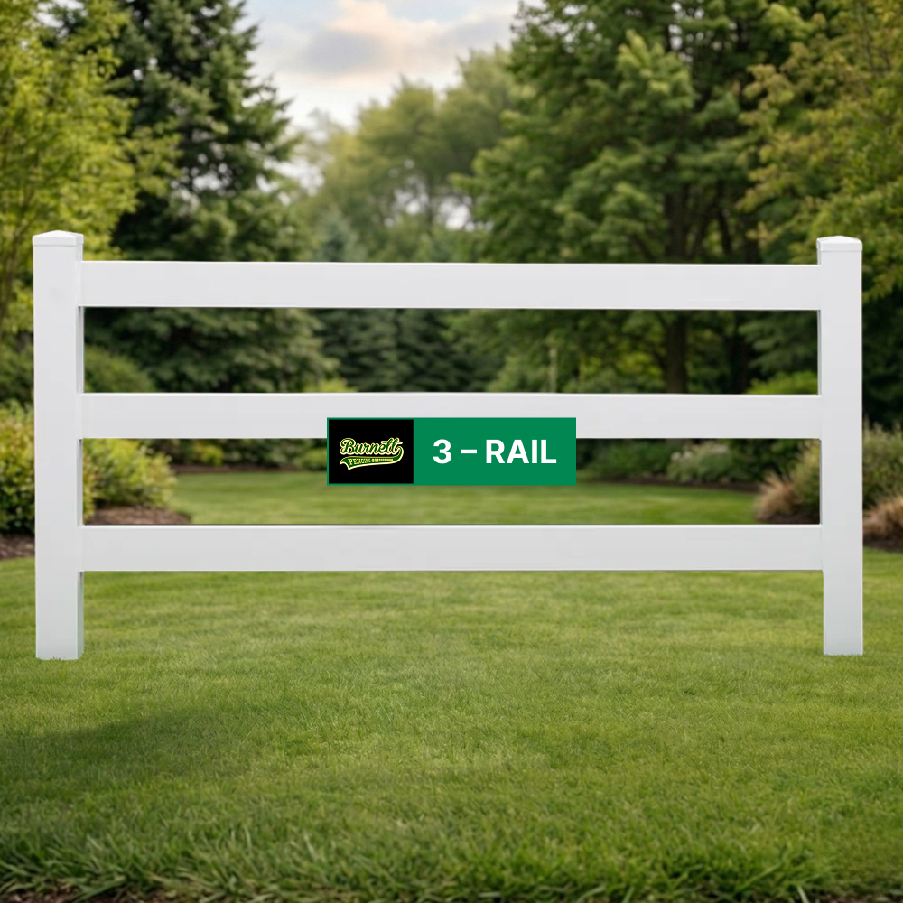 3 Rail white vinyl post and rail fence on a green lawn