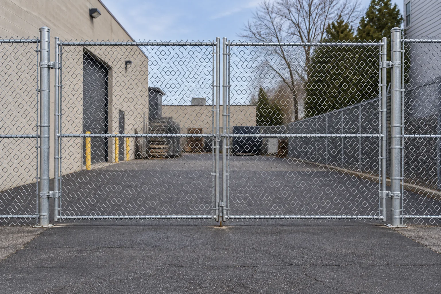 Tall perimeter chain link · gate design