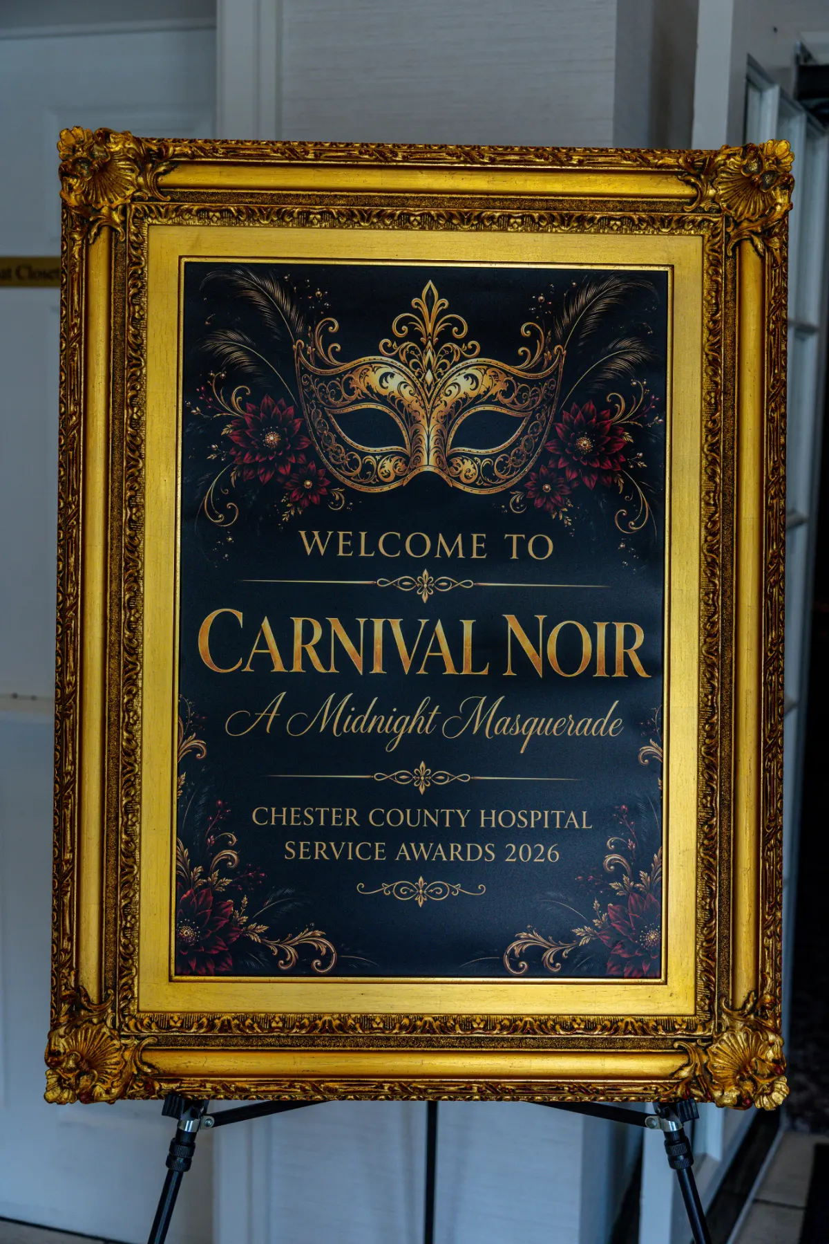 Welcome sign for Carnival Noir: A Midnight Masquerade, the Chester County Hospital Service Awards 2026, where magician and mentalist Jesse Dameron performed
