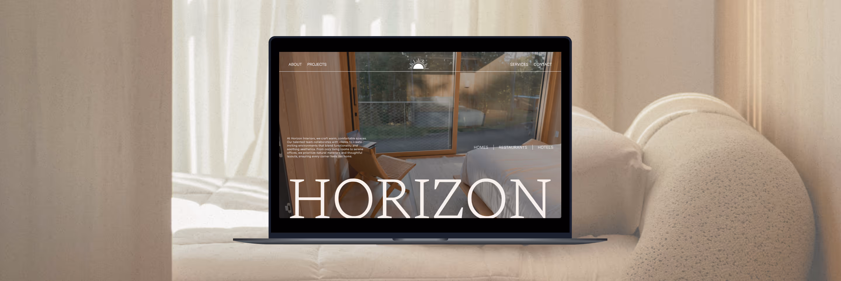Laptop on a beige sofa displaying a website homepage with the title 'Horizon' and a cozy interior photo.