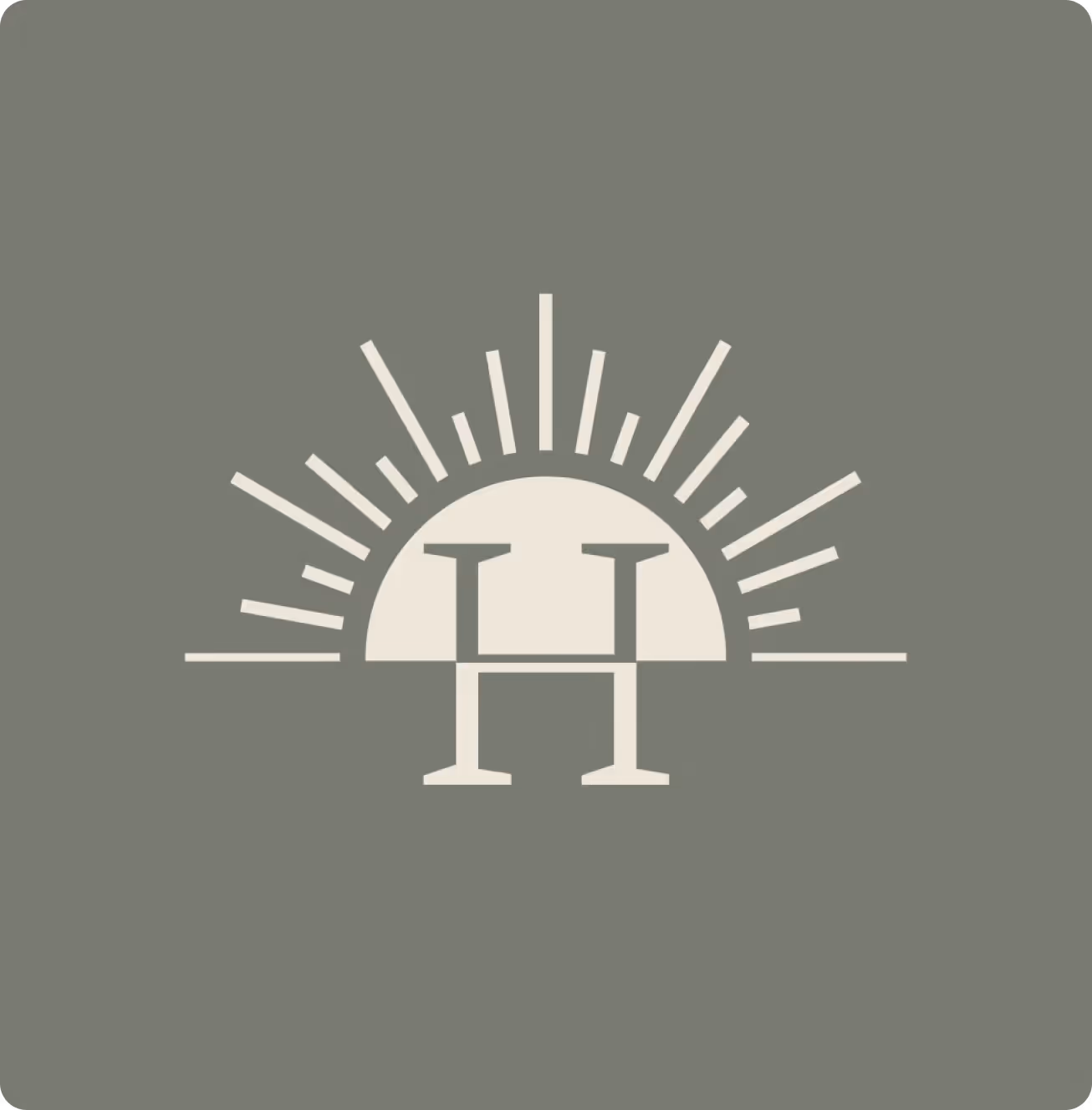 Stylized letter H integrated with a rising sun and rays graphic on a muted gray background.