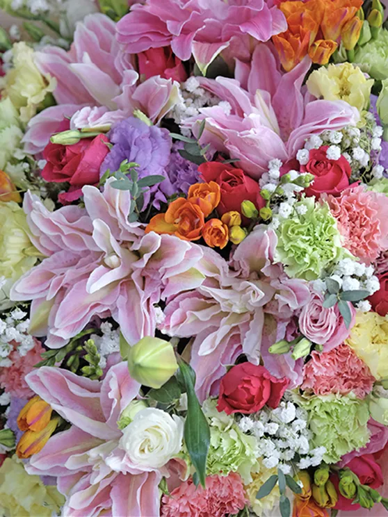 A large bouquet of colorful flowers on display.