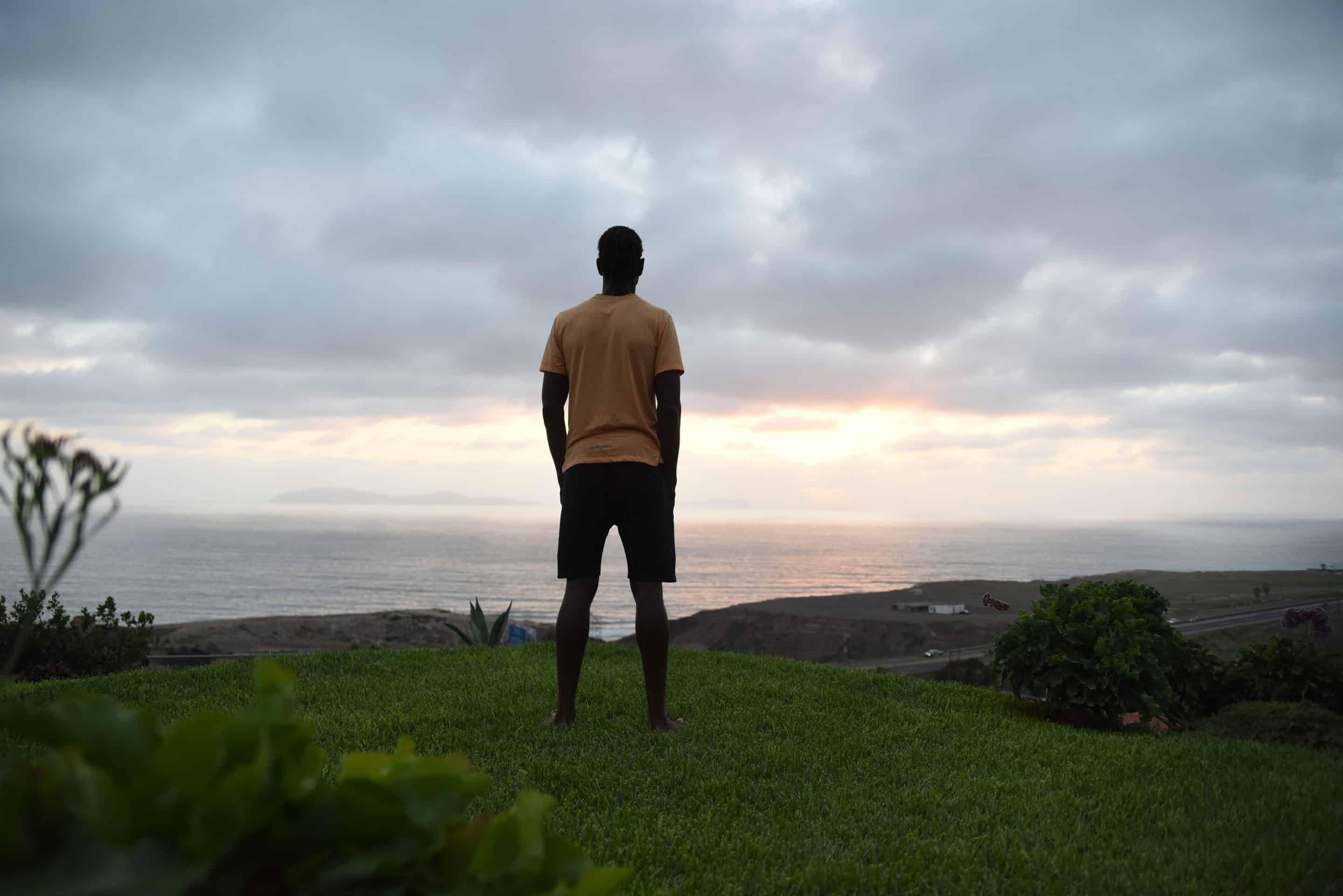 Man Looking at Sunset