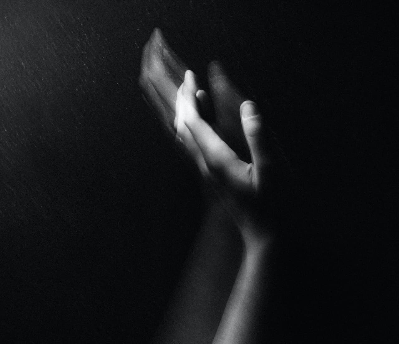 hands reaching for hope from opioids and addiction withdrawal