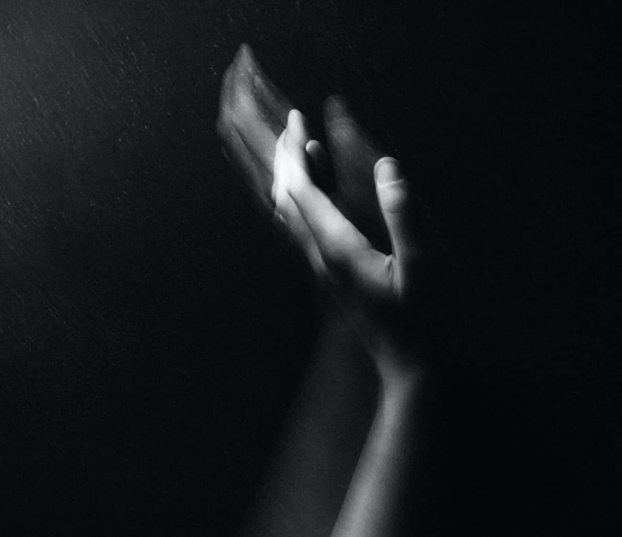 hands reaching for hope from opioids and addiction withdrawal