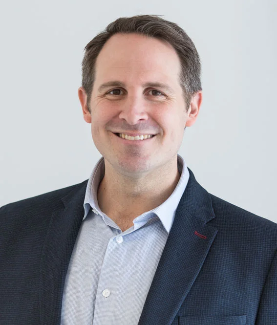 Smiling portrait of Edward Scott, Head of Operations at Miramar Global, London.