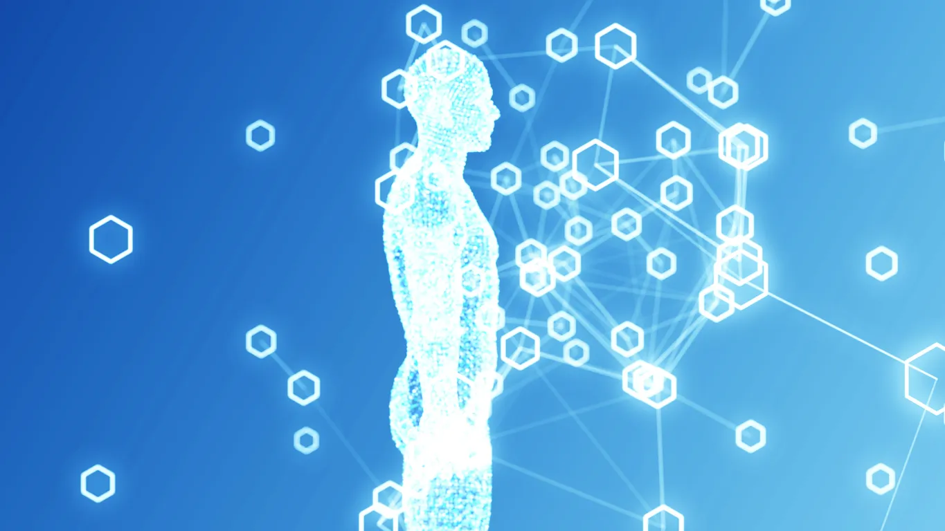 A glowing, digital human silhouette on a blue background, surrounded by interconnected hexagonal nodes. The scene conveys a futuristic, technological vibe.