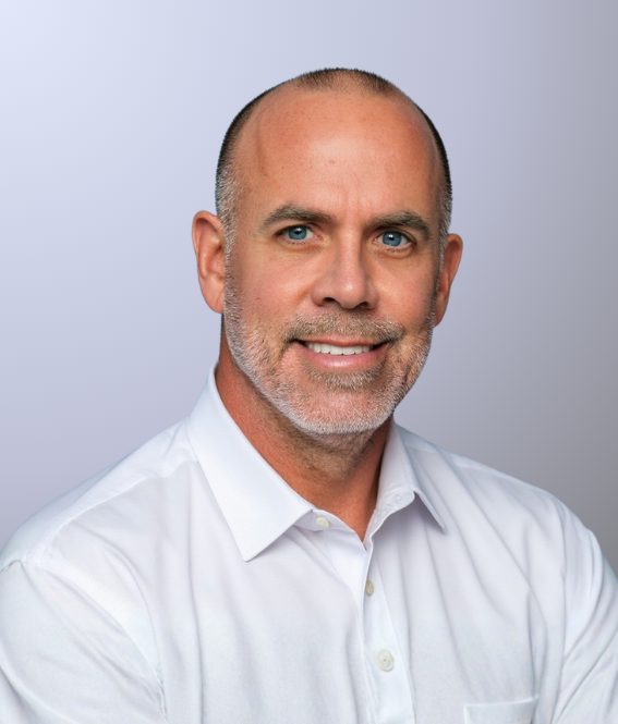 Smiling portrait of John R. Hodge, Managing Partner for US Sales, Philadelphia.