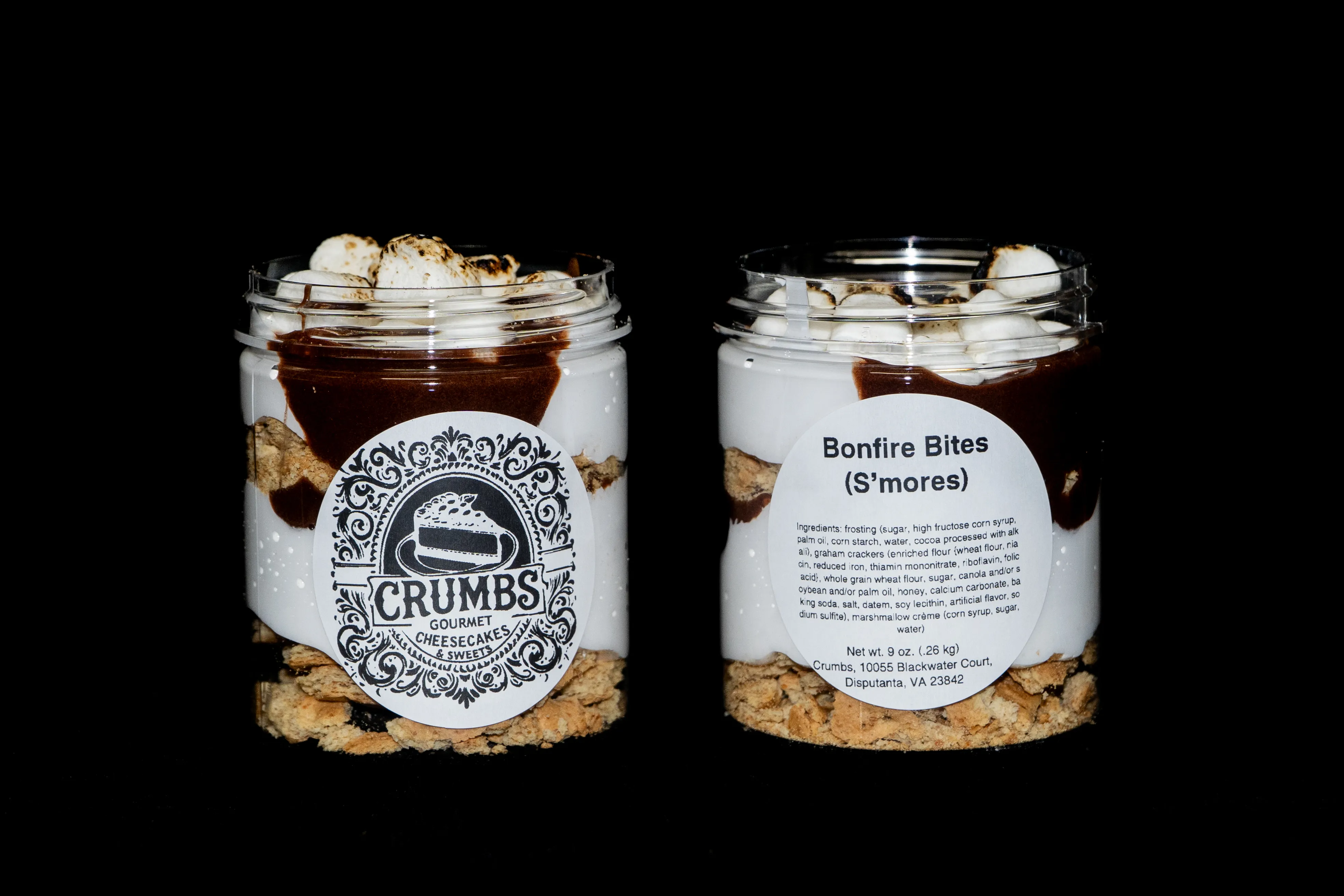 2 Smores cake jars with the Crumbs label on it. Chocolate, Marshmellow and graham cracker swirled in the container.