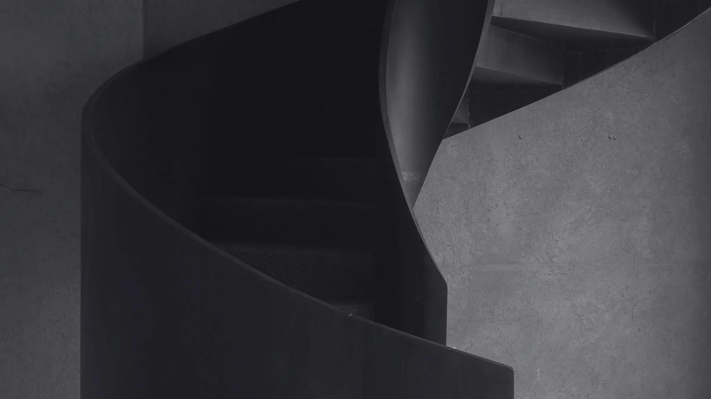 Dark steel spiral staircase in the Rigotang gallery, Marrakech