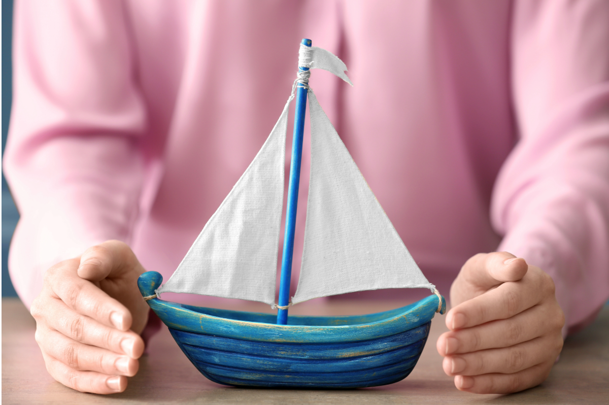 Woman holding a small dog