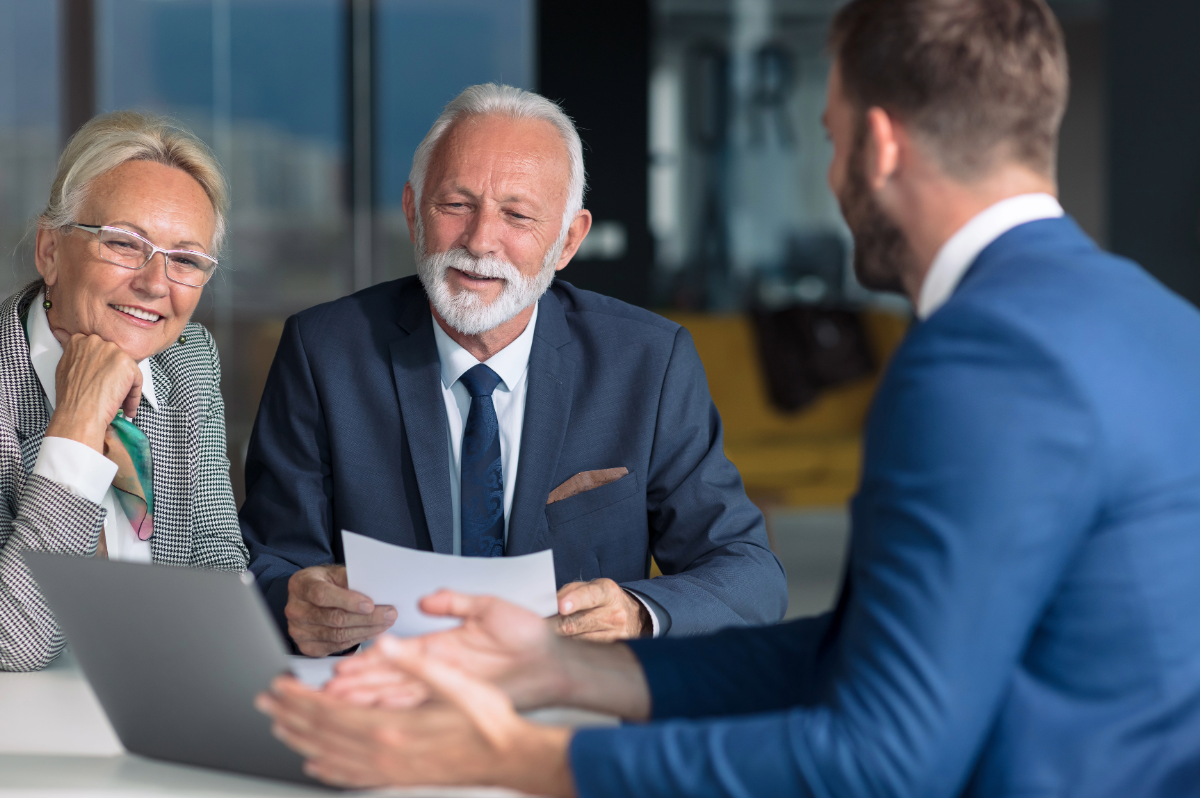 Team celebrating by joining hands