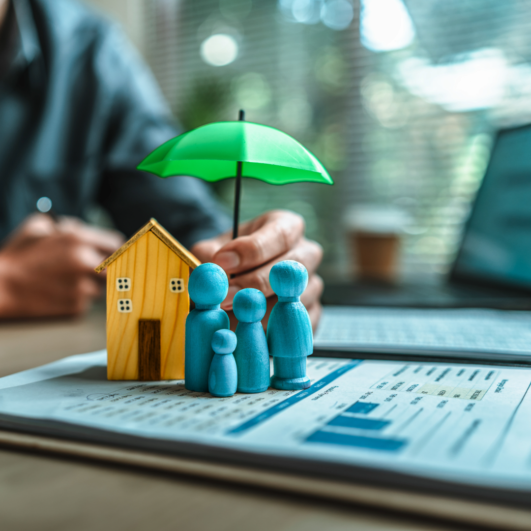 Baby and toddler laying on a bad