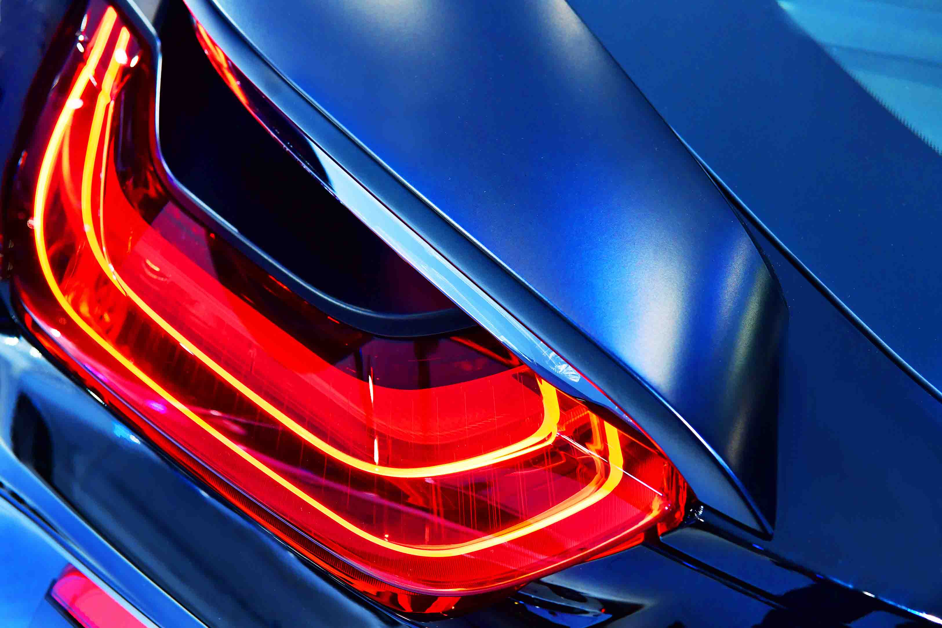 Car restoration, read bumper and lights.